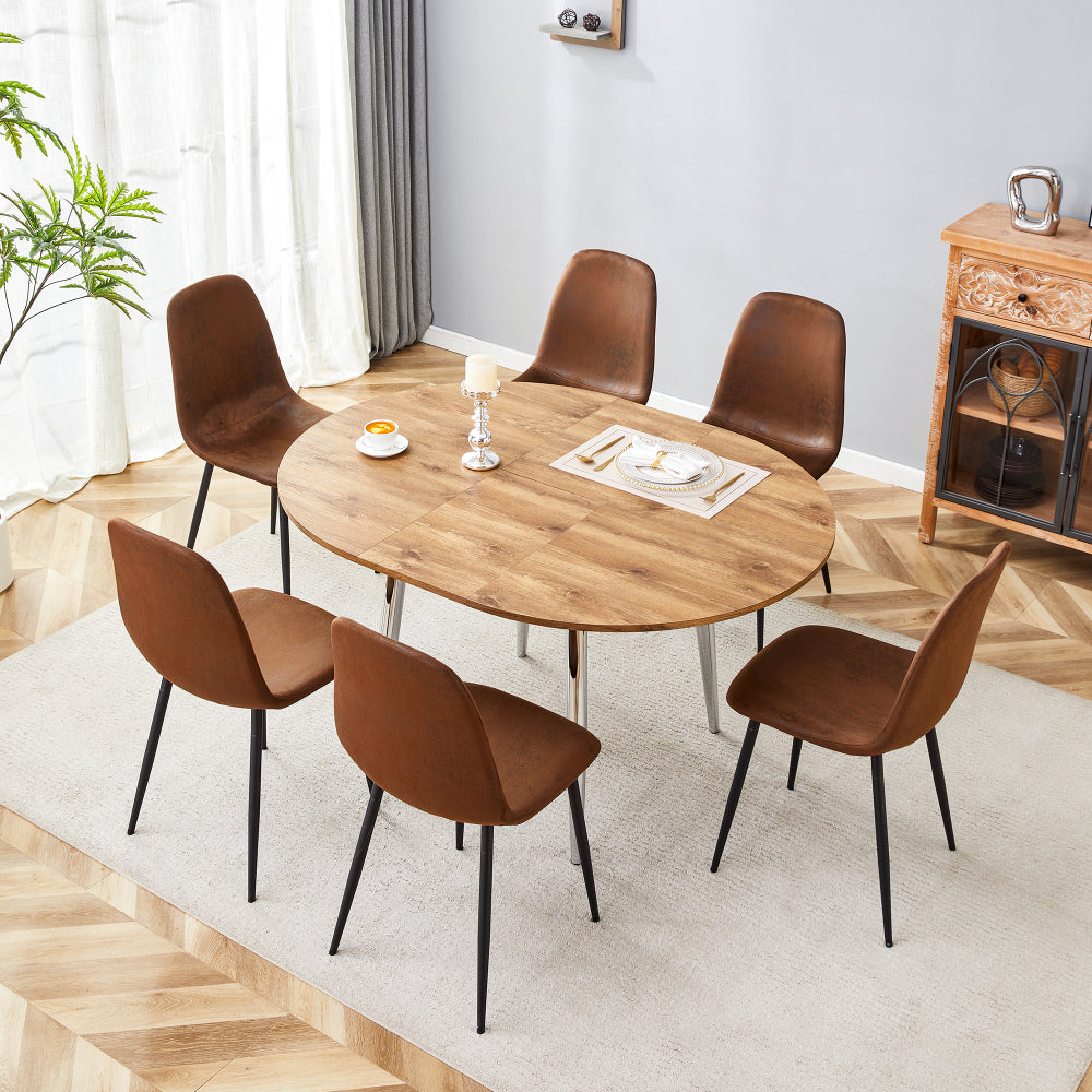 Table and chair set.With a Expandable mechanism,the Wood Grain MDF table top and silver metal legs and has a smooth surface.Paried With 6 chairs with soft suede cushions and black metal legs.