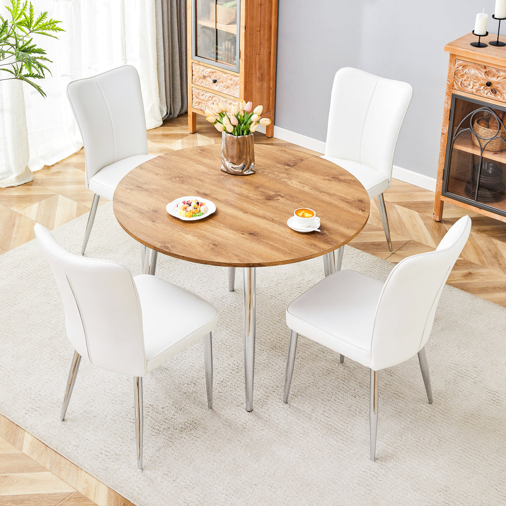 Table and chair set.With a Expandable mechanism,the Wood Grain MDF table top and silver metal legs and has a smooth surface.Paried With 4 White PU Chairs with a vertical stripe design on the backrest.